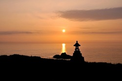 新潟県佐渡島の七浦海岸の春日崎の夕日